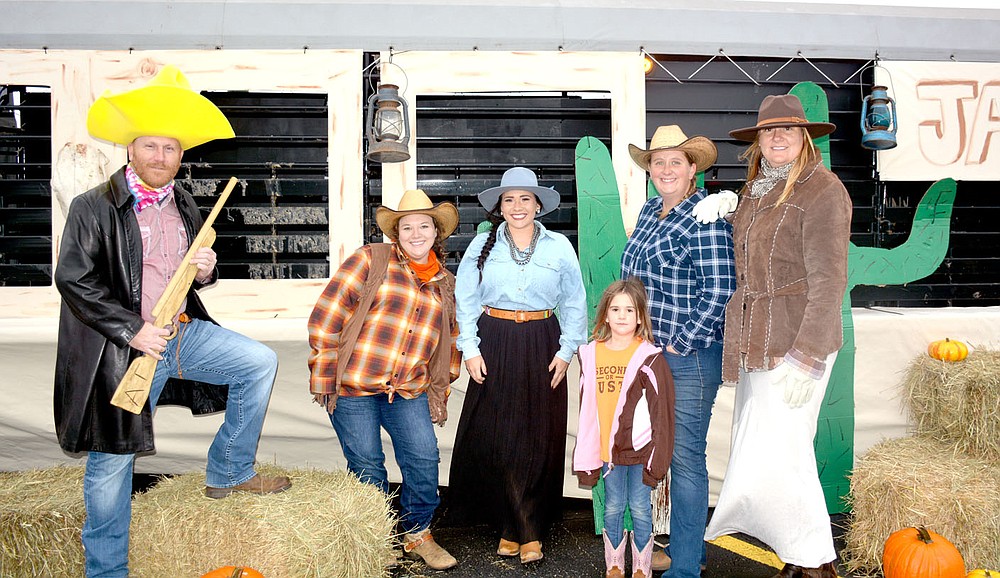 Marc Hayot / Herald-Leader "Sheriff"  Chris Taylor (left), Justine Reed, Blaine Graves, Emma Jetton, Heather Jetton and Kaci 