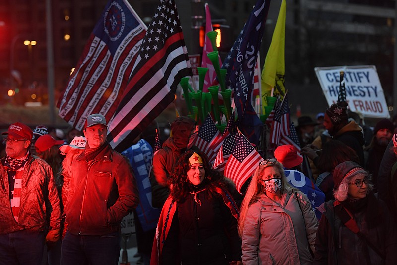 Supporters of President Donald Trump wend through Washington early on Jan. 6., 2021 in Washington. MUST CREDIT: Washington Post photo by Matt McClain