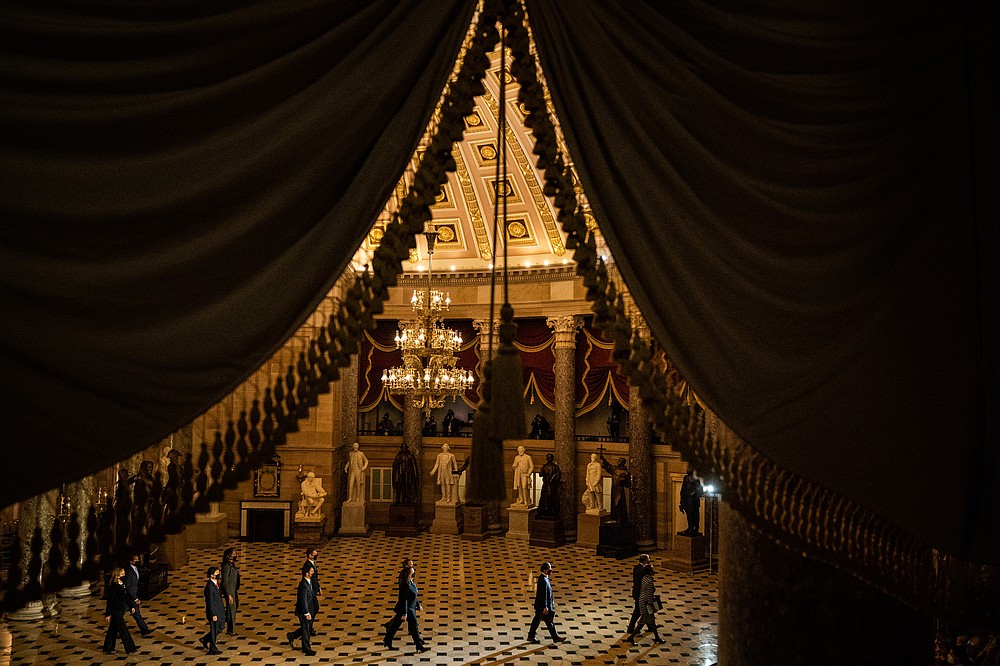House of Representatives impeachment mangers lead a procession with the an article of impeachment against former President Donald Trump through the National Statuary Hall on way to the United States Senate on Jan. 25, 2021 in Washington. MUST CREDIT: Washington Post photo by Salwan Georges