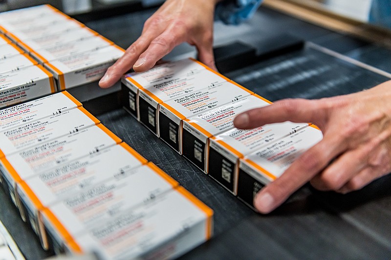 This October 2021 photo provided by Pfizer shows boxes of kid-size doses of its COVID-19 vaccine. The U.S. moved a step closer to expanding vaccinations for millions more children as a panel of government advisers on Tuesday, Oct. 26, endorsed kid-size doses of Pfizer's shots for 5- to 11-year-olds. (Pfizer via AP)