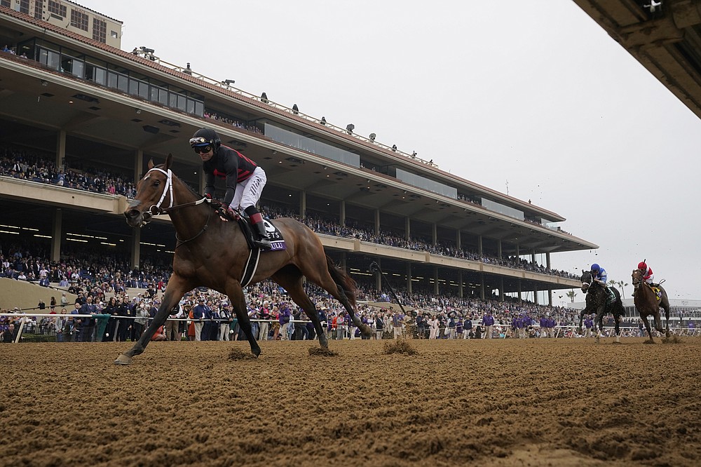 Joel Rosario rides Echo Zulu to win the Breeders' Cup Juvenile Fillies race at the Del Mar racetrack in Del Mar, Calif., Friday, Nov. 5, 2021. (AP Photo/Gregory Bull)