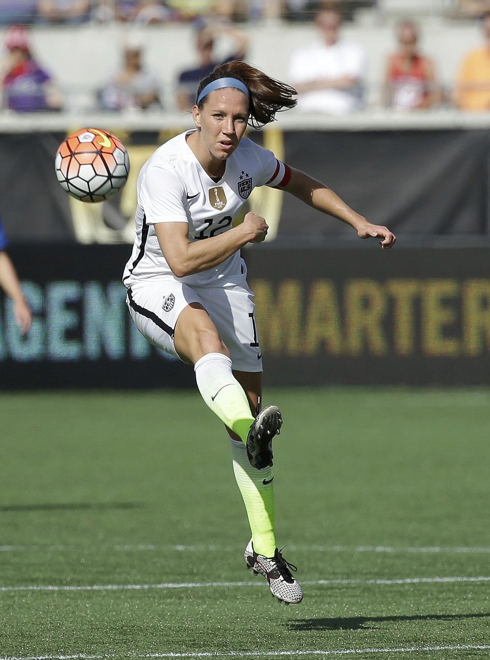 FILE - United States midfielder Lauren Holiday moves the ball against Brazil during the first half of an international friendly soccer match Sunday, Oct. 25, 2015, in Orlando, Fla. Holiday is expected to run in the 50th edition of the New York City Marathon on Sunday, Nov. 7, 2021. (AP Photo/John Raoux, File)