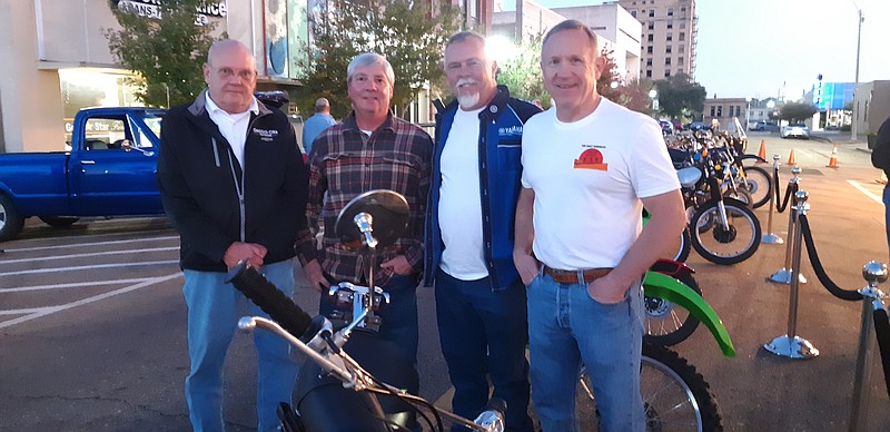 From left, James Bramlett, Randy Rape, Donny Daniel and Glenn Fricks with vintage motorcycles in front of the Perot Theater downtown on Saturday. The theater was showing the film, a 50th anniversary re-master of “On Any Sunday,”a film offering a different perspective of motorcycle culture, more family-friendly, less “Wild Bunch.” The film was a key inspiration for many riders, such as these four, who have been riding together for 50 years. (Staff photo by Junius Stone)