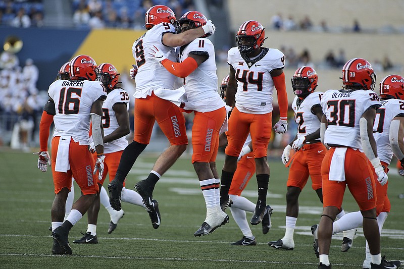 Sanders throws 2 TDs passes, No. 11 Oklahoma State tops WVU Texarkana