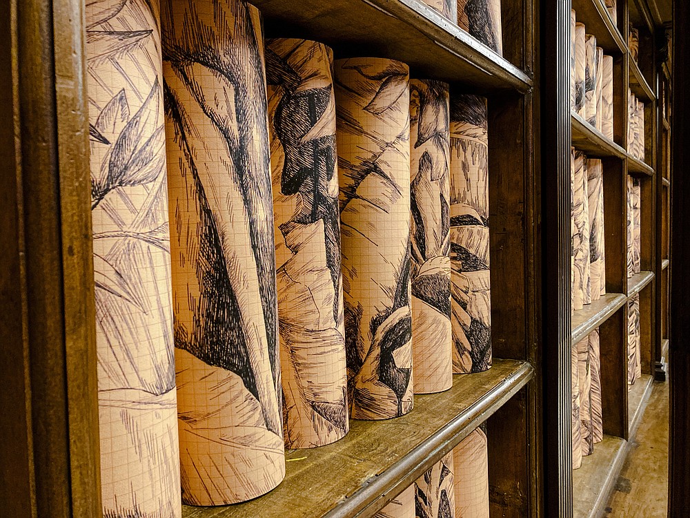 A view of the Vatican Apostolic Library, Monday, Nov. 8, 202, during the presentation to the media of the exhibition "Tutti" (All). The exhibition runs through Feb. 22, 2022 and takes its inspiration from Pope Francis' 2020 encyclical "Brothers All" which combines his appeals for environmental sustainability, greater human fraternity and a more just socio-economic order in the post-COVID world. (AP Photo/Nicole Winfield)