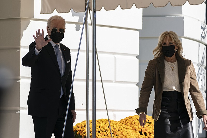 President Joe Biden, and first lady Jill Biden walk to board Marine One on the South Lawn of the White House in Washington, Saturday, Nov. 6, 2021. Biden is spending the weekend at his home in Rehoboth Beach, Del. (AP Photo/Alex Brandon)