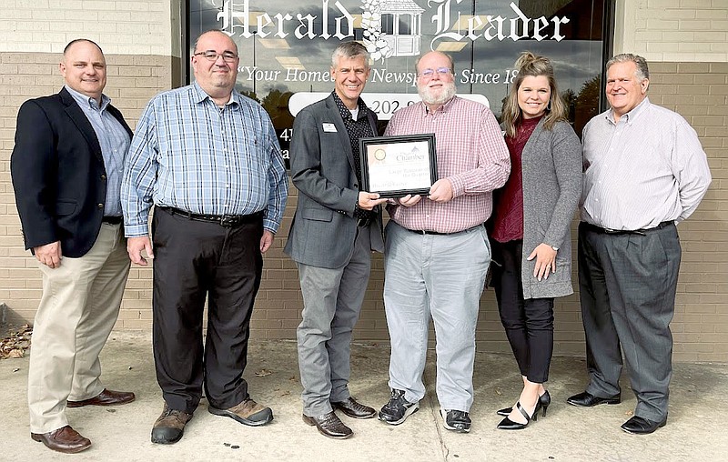 Photo submitted The Siloam Springs Herald-Leader won Business of the Quarter from the Siloam Springs Chamber of Commerce. The Herald-Leader won for the category of large business for the months of July, August and September. The Herald-Leader received the award on Nov. 3.