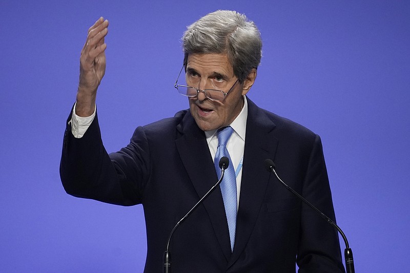 John Kerry, United States Special Presidential Envoy for Climate speaks immediately after a press conference given by China's Special Envoy for Climate Change Xie Zhenhua at the COP26 U.N. Climate Summit, in Glasgow, Scotland, Wednesday, Nov. 10, 2021. The U.N. climate summit in Glasgow has entered its second week as leaders from around the world, are gathering in Scotland's biggest city, to lay out their vision for addressing the common challenge of global warming. (AP Photo/Alberto Pezzali)