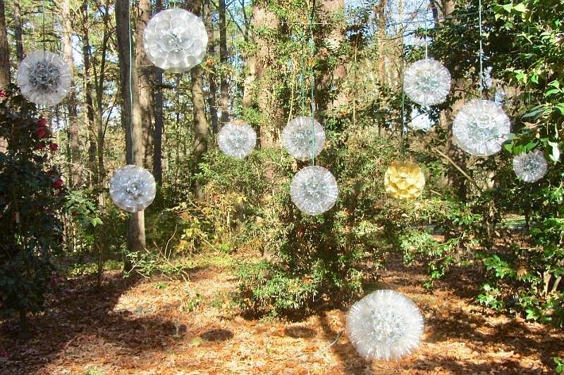 Hanging spheres brighten one of Garvan Woodland Gardens’ decorated trails. (Special to the Democrat-Gazette/Marcia Schnedler)
