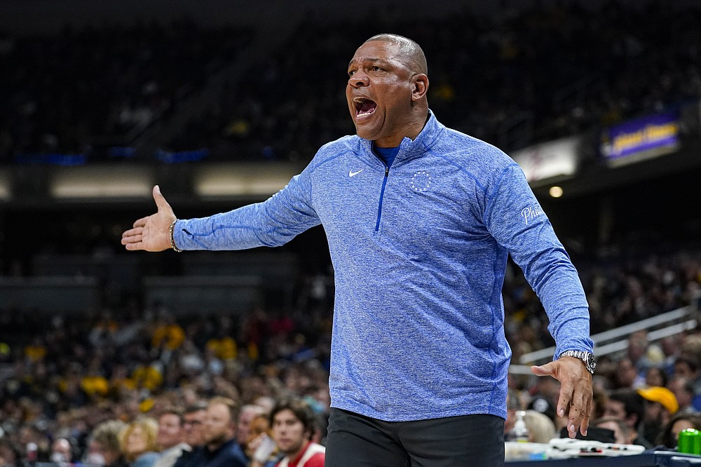 Philadelphia 76ers head coach Doc Rivers questions a call during the second half of an NBA basketball game against the Indiana Pacers in Indianapolis, Saturday, Nov. 13, 2021. The Pacers defeated the 76ers 118-113. (AP Photo/Michael Conroy)