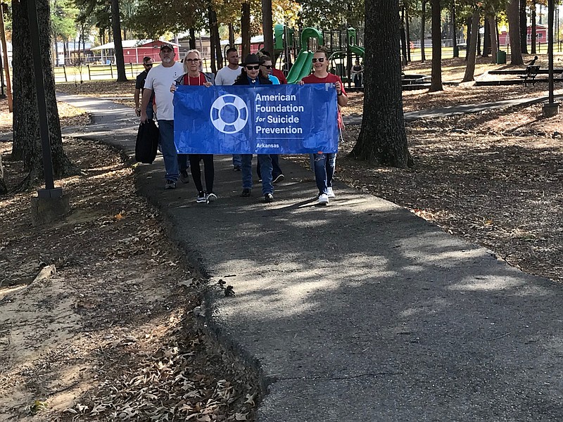 Local members of the American Foundation for Suicide Prevention conduct their Fifth Annual Out of the Darkness Walk through Bobby Ferguson Park. The event focused on suicide awareness and prevention.