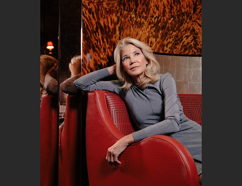 Candace Bushnell relaxes in a chair in New York on Nov. 4. The writer maps her life in a one-woman show, “Is There Still Sex in the City?” It began previews Nov. 13 at the Daryl Roth Theater. (Celeste Sloman/The New York Times)