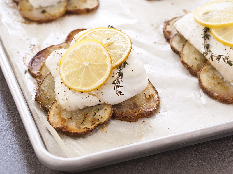 Lemon-Herb Roasted Cod With Crispy Garlic Potatoes

(Courtesy of America’s Test Kitchen)