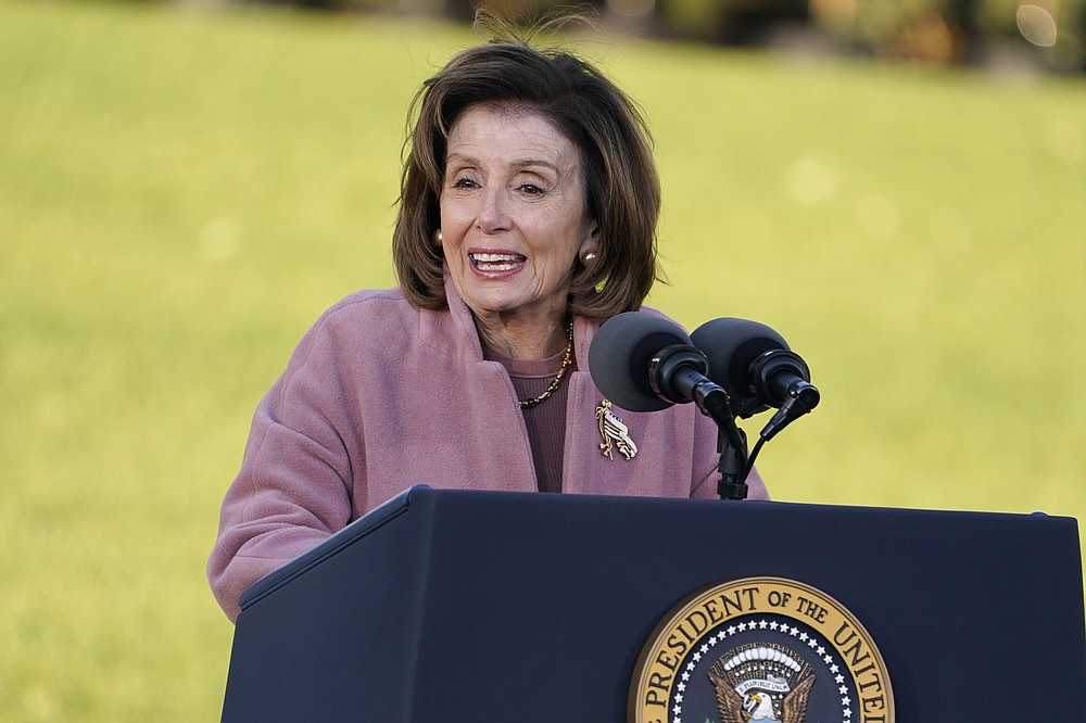 House Speaker Nancy Pelosi of Calif., speaks before President Joe Biden signs the $1.2 trillion bipartisan infrastructure bill into law during a ceremony on the South Lawn of the White House in Washington, Monday, Nov. 15, 2021. (AP Photo/Evan Vucci)