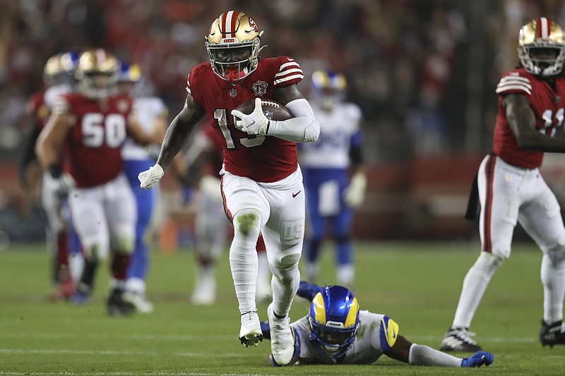 Deebo Samuel of the San Francisco 49ers runs for a touchdown in