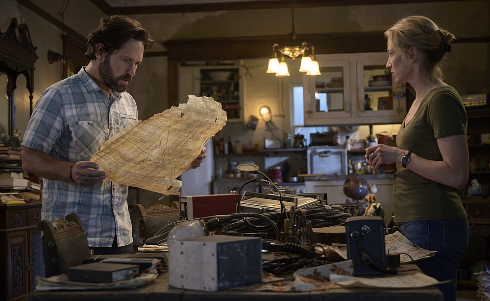 This image released by Sony Pictures shows Paul Rudd, left, and Carrie Coon in a scene from "Ghostbusters: Afterlife." (Kimberley French/Sony Pictures via AP)