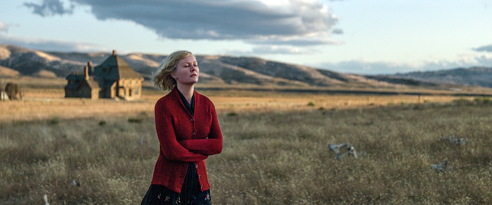 This image released by Netflix shows Kirsten Dunst in a scene from "The Power of the Dog" (Netflix via AP)
