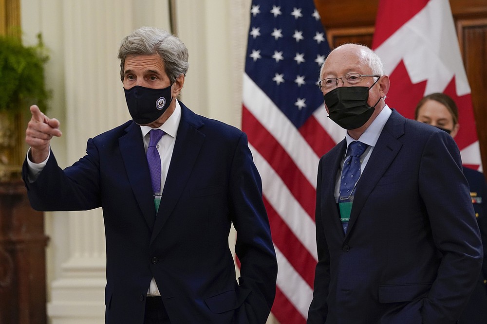 Special Presidential Envoy for Climate John Kerry and U.S, Ambassador to Mexico Ken Salazar talk before President Joe Biden Mexican President Andrés Manuel López Obrador Canadian Prime Minister Justin Trudeau arrive for a meeting in the East Room of the White House in Washington, Thursday, Nov. 18, 2021. (AP Photo/Susan Walsh)