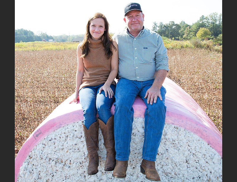 Anna Brakefield and her father, Mark Yeager, pictured above on their family’s Alabama cotton farm, co-own Red Land Cotton. The company grows all the cotton and makes its sheets and towels in America, thus avoiding any supply-chain problems. (Courtesy Red Land Cotton)