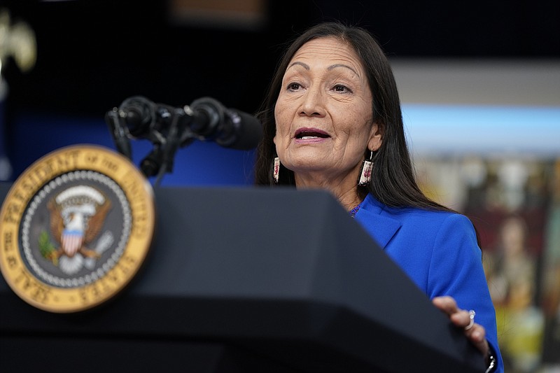 FILE - Interior Secretary Deb Haaland speaks during a Tribal Nations Summit during Native American Heritage Month, in the South Court Auditorium on the White House campus, on Nov. 15, 2021, in Washington. Secretary Haaland on Friday, Nov. 19, 2021, declared &quot;squaw&quot; to be a derogatory term and said she is taking steps to remove the term from federal government use and to replace other derogatory place names. (AP Photo/Evan Vucci, File)