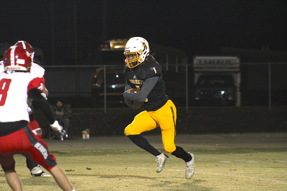 Photo By: Michael Hanich
Harmony Grove senior running back Tobias Hicks looking for a running lane against the defense of Glen Rose.