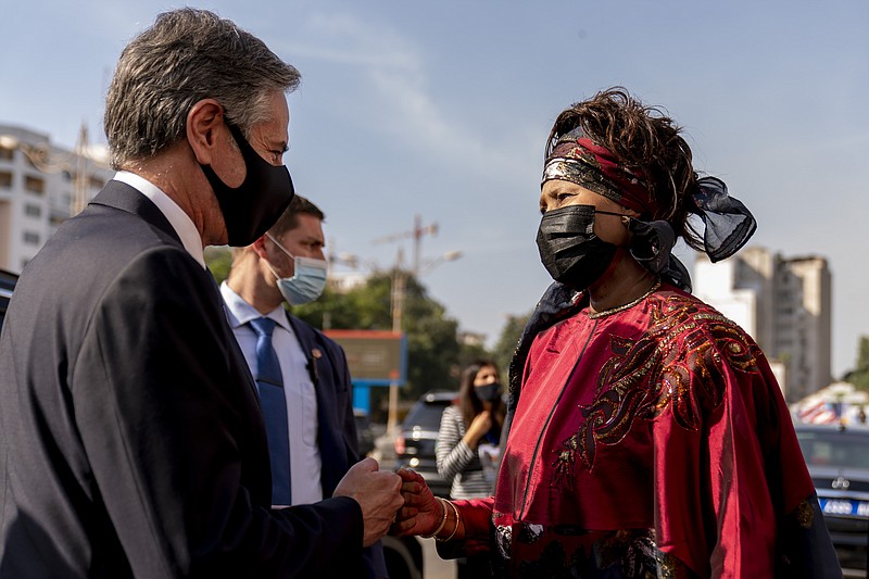 Secretary of State Antony Blinken, accompanied by Senegalese Foreign Minister Aissata Tall Sall, departs following a news conference at the Ministry of Foreign Affairs in Dakar, Senegal, Saturday, Nov. 20, 2021. Blinken is on a five day trip to Kenya, Nigeria, and Senegal. (AP Photo/Andrew Harnik, Pool)