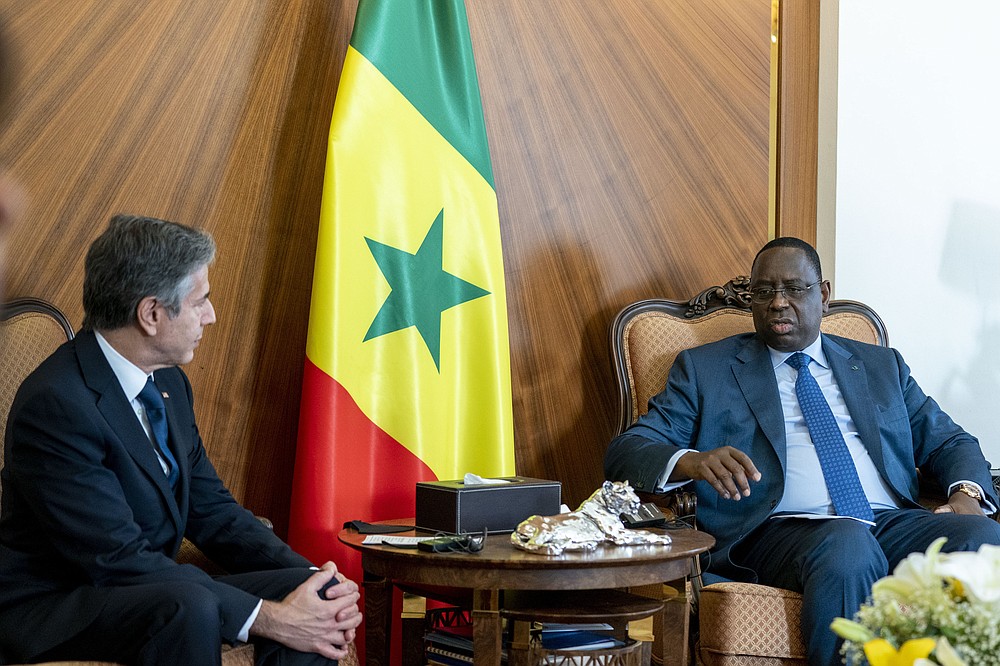 US Secretary of State Antony Blinken, left, meets with Senegalese President Macky Sall at the Presidential Palace in Dakar, Senegal, Saturday, Nov. 20, 2021. Blinken is on a five day trip to Kenya, Nigeria, and Senegal. (AP Photo/Andrew Harnik, Pool)