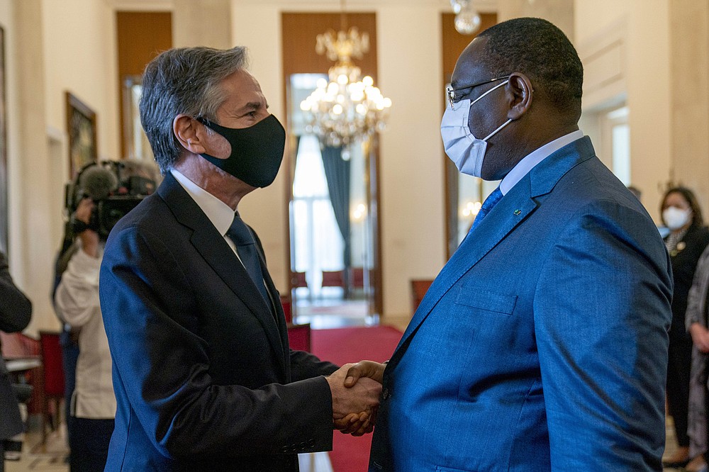 US Secretary of State Antony Blinken meets with Senegalese President Macky Sall at the Presidential Palace in Dakar, Senegal, Saturday, Nov. 20, 2021. Blinken is on a five day trip to Kenya, Nigeria, and Senegal. (AP Photo/Andrew Harnik, Pool)