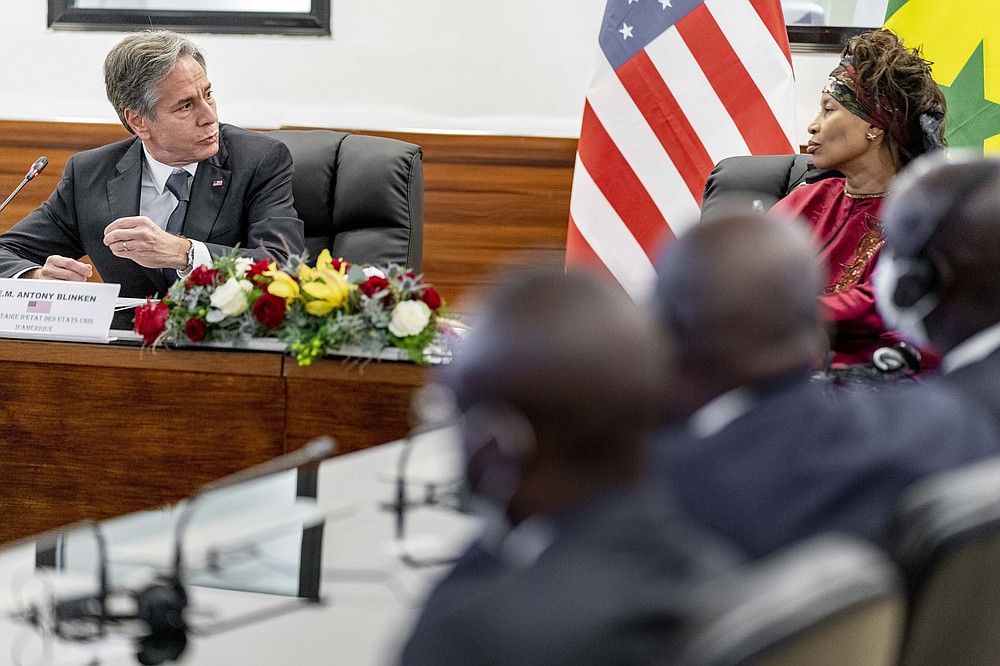 Secretary of State Antony Blinken, accompanied by Senegalese Foreign Minister Aissata Tall Sall, speaks at a meeting at the Ministry of Foreign Affairs in Dakar, Senegal, Saturday, Nov. 20, 2021. Blinken is on a five day trip to Kenya, Nigeria, and Senegal. (AP Photo/Andrew Harnik, Pool)