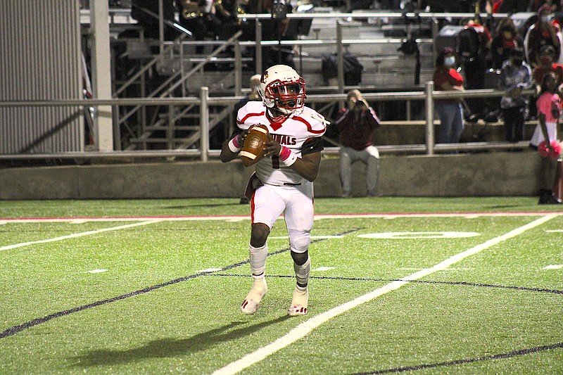 Photo By: Michael Hanich
Camden Fairview quarterback Martavius Thomas looks for an open receiver in the game against Hope.