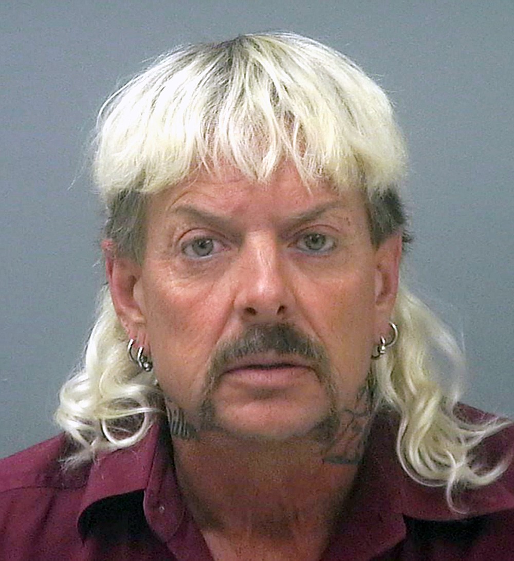 FILE - This undated file photo provided by the Santa Rose County Jail in Milton, Fla., shows Joseph Maldonado-Passage, also known as Joe Exotic. The former zookeeper has been transferred to a medical facility in North Carolina for federal inmates after a cancer diagnosis, according to his attorney. (Santa Rosa County Jail via AP, File)