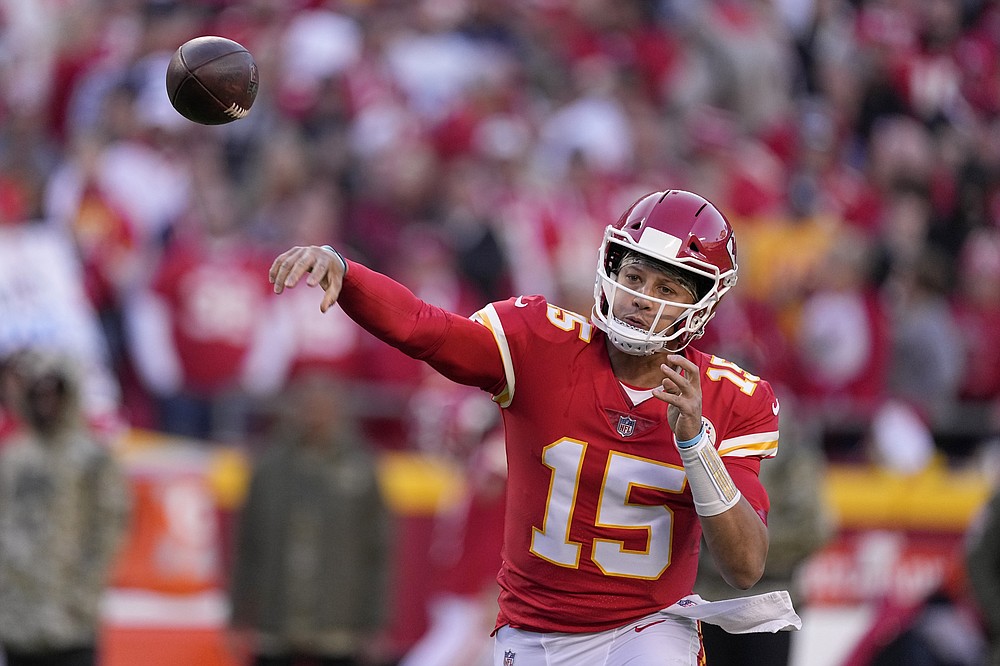 Dallas Cowboys safety Jayron Kearse runs with the ball after intercepting a  pass as Kansas City Chiefs quarterback Patrick Mahomes (15) defends during  the second half of an NFL football game Sunday