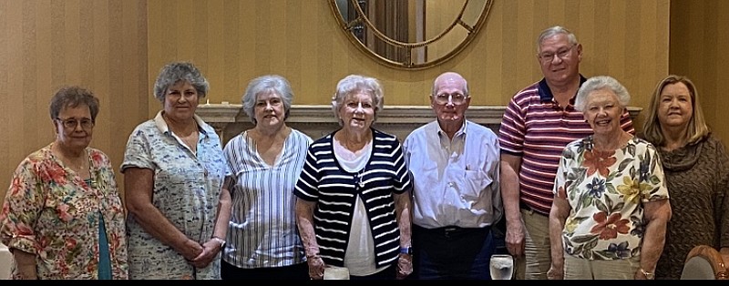 From left are Linda Jester, Linda Vandenberg White, Peggy Cara, Peggy Vandenberg, John Ochsner, Charles McLemore, Frankie Ochsner and Belinda Jones. Not pictured are Pat McLemore and Sheila Beatty-Krout. The committee represents their communities of Benton, Mount Ida, Hot Springs and Hot Springs Village.  - Submitted photo
