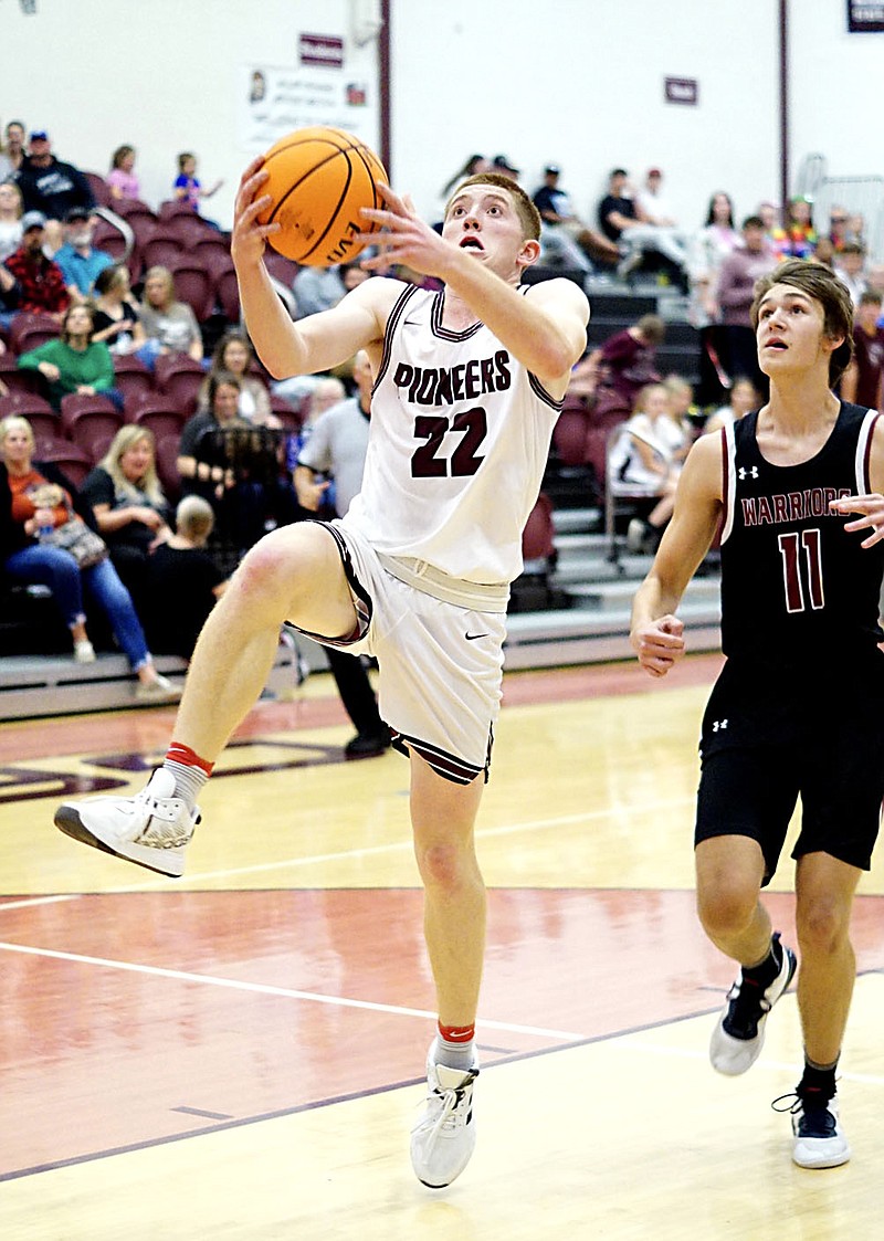 Westside Eagle Observer/RANDY MOLL
Gentry's Bart Walker goes up for a shot from under the basket in play against Life Way at Gentry High School on Nov. 16.