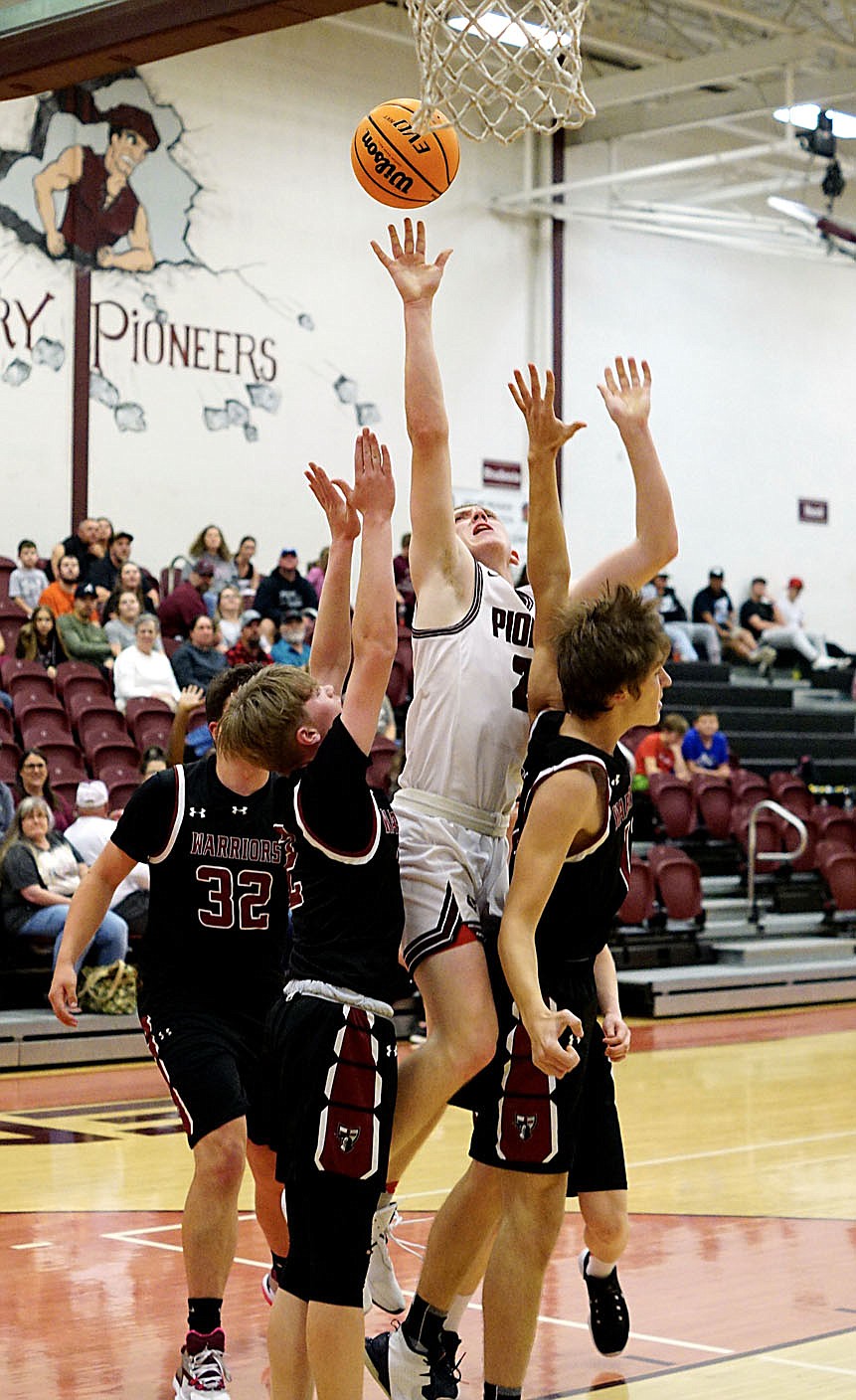 Westside Eagle Observer/RANDY MOLL
Gentry's Bart Walker goes up for a shot from under the basket in play against Life Way at Gentry High School on Nov. 16.