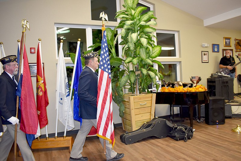 RACHEL DICKERSON/MCDONALD COUNTY PRESS The honor guard from the American Legion Post 392 posts the colors during an event honoring veterans at the McDonald County Senior Center in Noel on Saturday.