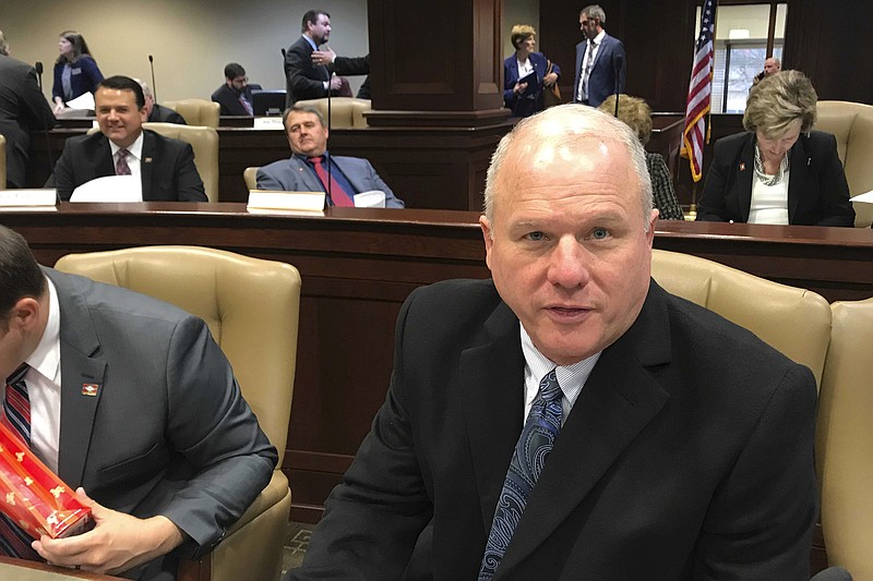 FILE - Then - Senate President Jim Hendren speaks to reporters Jan. 14, 2019 at the state Capitol in Little Rock, Ark. Sen. Hendren announced Monday, Nov. 22, 2021, that he would not seek another term representing northwest Arkansas in the Senate. Hendren is a former president of the state Senate who has served in the chamber since 2013. Previously, he had served in the state House of representatives from 1995 until 1999. He is the nephew of Arkansas Gov. Asa Hutchinson. (AP Photo/Andrew Demillo File)