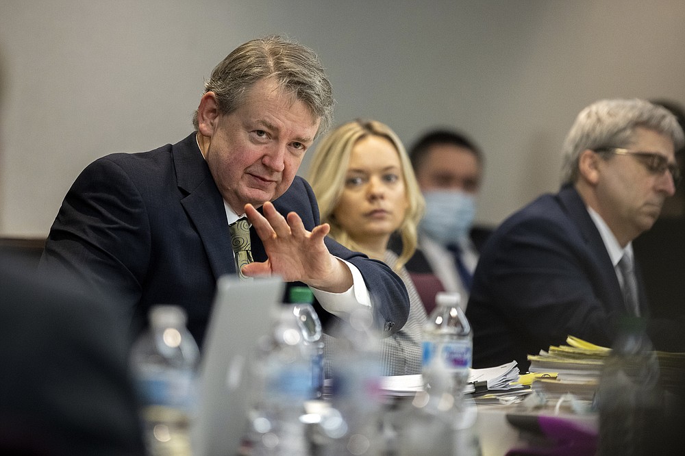 Defense attorney Kevin Gough addresses the court during the trial of Travis McMichael, his father, Gregory McMichael, and William "Roddie" Bryan, at the Glynn County Courthouse, Monday, Nov. 22, 2021, in Brunswick, Ga. The three men charged with the February 2020 slaying of 25-year-old Ahmaud Arbery. (AP Photo/Stephen B. Morton, Pool)