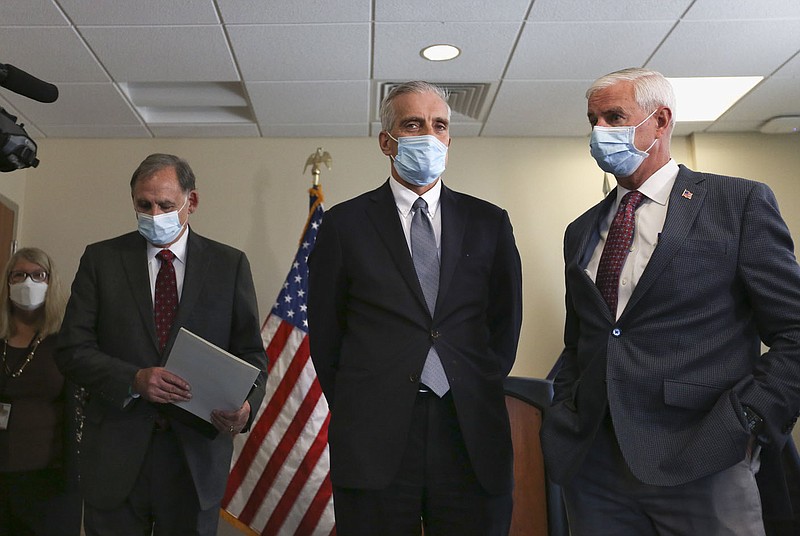 Senator John Boozeman (from left), VA Secretary Denis McDonough and Congressman Steve Womack prepare to speak during a press conference, Monday, November 22, 2021 at the VA Medical Center in Fayetteville. Check out nwaonline.com/211123Daily/ for today's photo gallery. 
(NWA Democrat-Gazette/Charlie Kaijo)