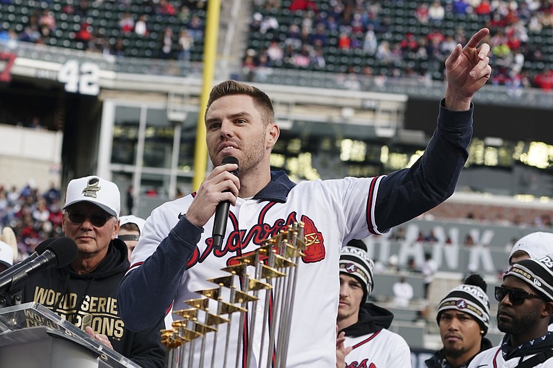Atlanta Braves' Freddie Freeman speaks during a celebration at Truist Park, Friday, Nov. 5, 2021, in Atlanta. The Braves beat the Houston Astros 7-0 in Game 6 on Tuesday to win their first World Series MLB baseball title in 26 years. (AP Photo/John Bazemore)