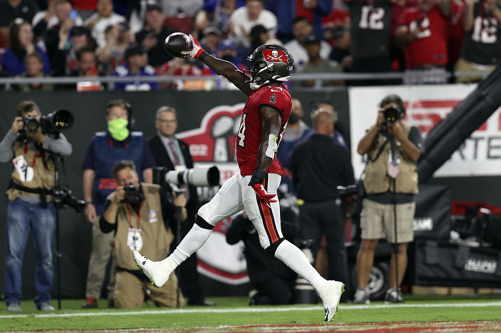 Bucs reward fan who gave back Tom Brady's 600th-TD ball with season tickets,  signed memorabilia