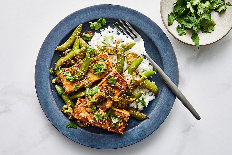 Hot and Sour Seared Tofu With Snap Peas (The New York Times/Kate Sears)