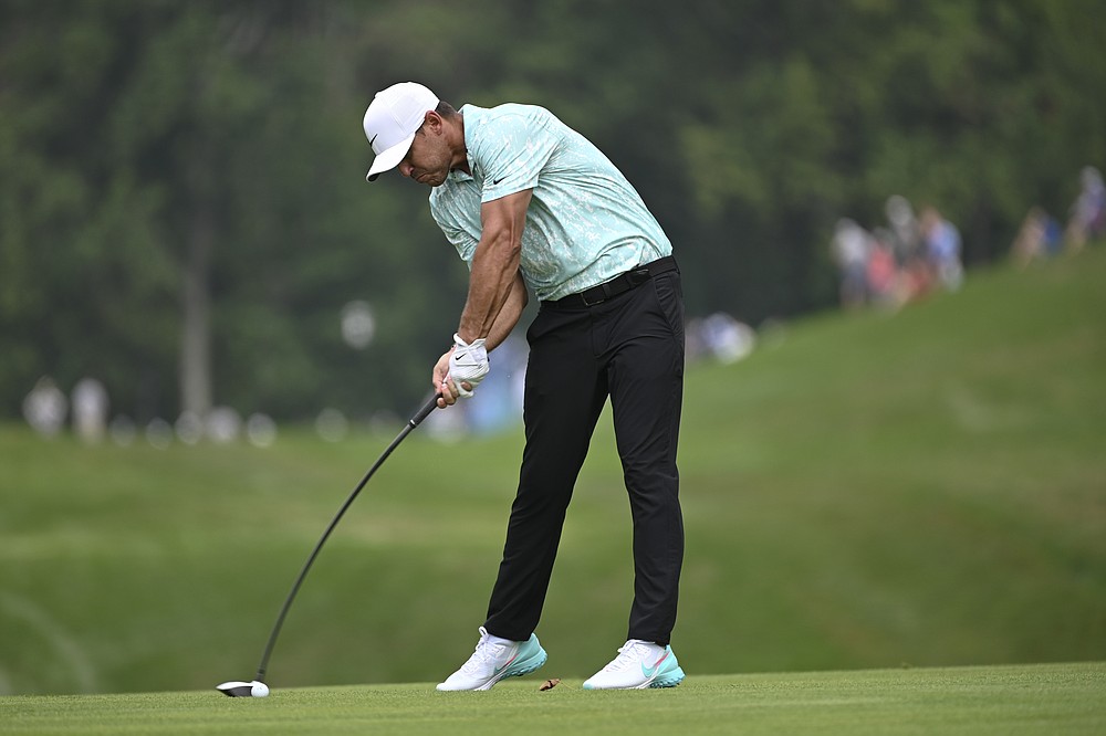 FILE - Brooks Koepka hits from the fourth fairway during the third round of the BMW Championship golf tournament Aug. 28, 2021, at Caves Valley Golf Club in Owings Mills, Md. Koepka is playing an exhibition match on Nov. 27 in Las Vegas against Bryson DeChambeau. (AP Photo/Terrance Williams, File)