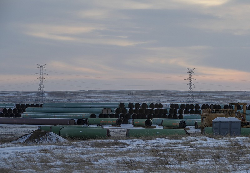 Pipes for the Keystone XL pipeline stacked in a yard near Oyen, Alberta, on Jan. 26, 2021. MUST CREDIT: Bloomberg photo by Jason Franson.