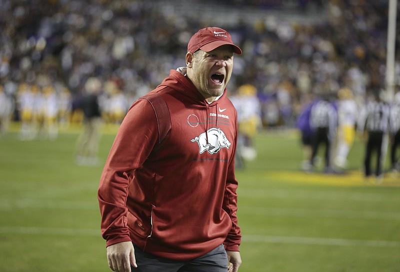 Arkansas Defensive Coordinator Barry Odom directs his players, Saturday, November 13, 2021 before the start of a football game at Tiger Stadium in Baton Rouge, La. Check out nwaonline.com/211114Daily/ for today's photo gallery. 
(NWA Democrat-Gazette/Charlie Kaijo)