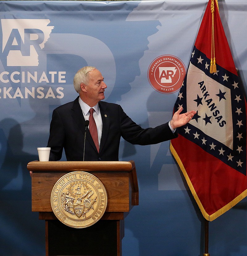 Gov. Asa Hutchinson talks about the daily COVID-19 numbers during his weekly briefing on Tuesday, Nov. 23, at the state Capitol in Little Rock. (Arkansas Democrat-Gazette/Thomas Metthe)