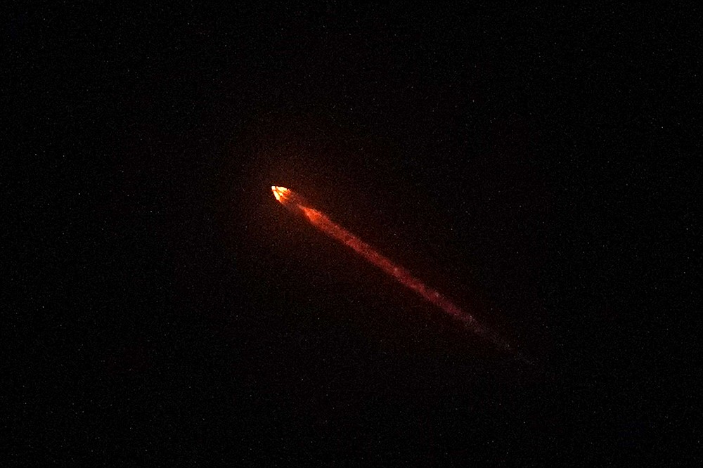 The DART spacecraft, short for Double Asteroid Redirection Test, atop a SpaceX Falcon 9 rocket is seen Tuesday, Nov. 23, 2021, from Simi Valley, Calif. after launching from Vandenberg Space Force Base. (AP Photo/Mark J. Terrill)