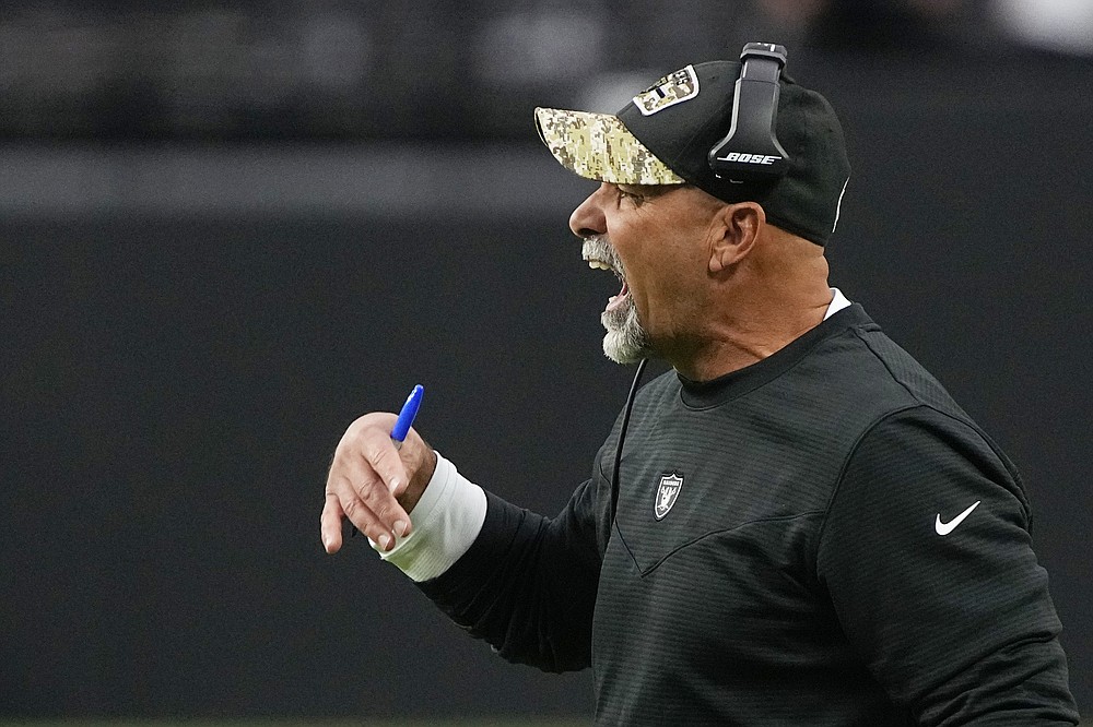 Las Vegas Raiders interim head coach Rich Bisaccia yells towards the field against the Cincinnati Bengals during the first half of an NFL football game, Sunday, Nov. 21, 2021, in Las Vegas. (AP Photo/Rick Scuteri)