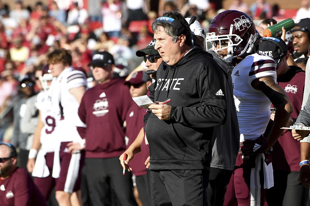 Mississippi State Mike Leach looks on from the sideline during the first half of an NCAA college football game against Arkansas, Saturday, Nov. 6, 2021, in Fayetteville, Ark. (AP Photo/Michael Woods)
