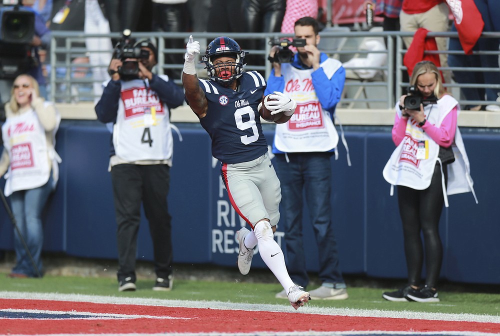 Mississippi running back Jerrion Ealy scores on a 70-yard touchdown against Liberty during the first half of an NCAA college football game in Oxford, Miss., Saturday, Nov. 6, 2021. (Thomas Wells/The Northeast Mississippi Daily Journal via AP)